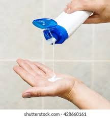 Pouring Shampoo On His Hand Stock Photo ...
