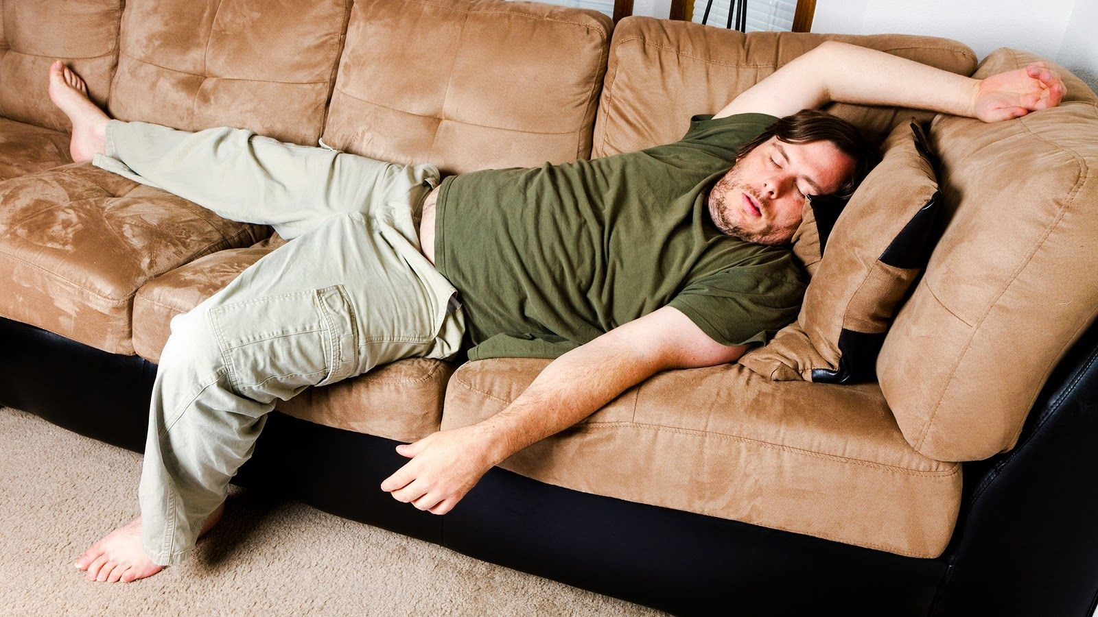 sleeping-on-the-couch--not-good-for-your-back-or-neck.jpg